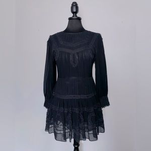 Love Shack Fancy Black sheer long sleeve dress. Good condition.